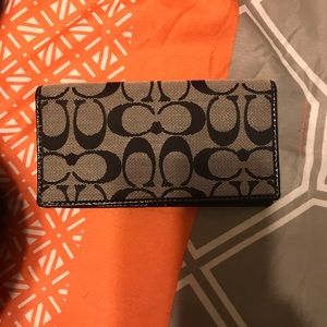 Coach checkbook cover